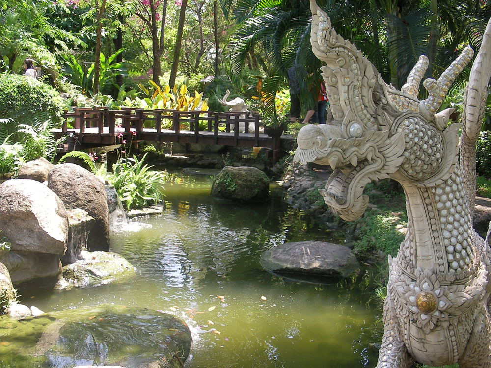 Naga or Mythical Dragons strategically placed in a stream at Erawan Monument Bangkok
